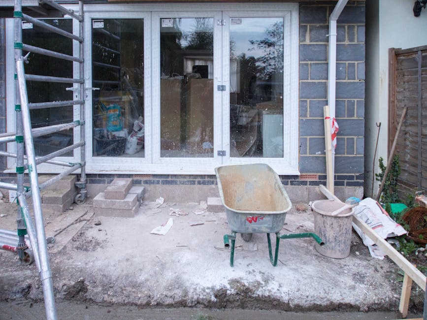 Professional renovation contractors showcasing before and after home transformation