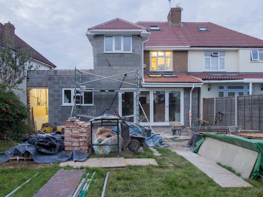 Reliable home addition contractors working on professional property management construction project