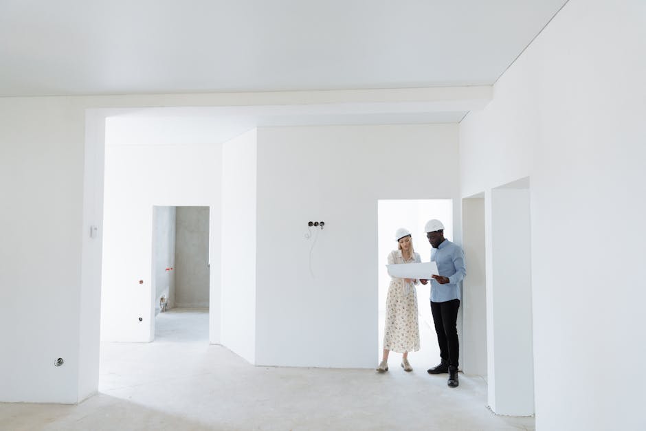 Professional renovation contractors at a modern construction company office